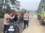 Polsek Kelayang Bagikan Masker Gratis kepada Pengguna Jalan