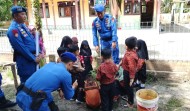 Satpolairud Siak Tanamkan Cinta Lingkungan Sejak Dini Lewat Gree Policin  di TK Sejati Pusako