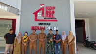 Kades Beringin Indah Bersama Babinsa Tinjau Gedung Koperasi Merah Putih Gunakan Drone