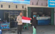 Merah Putih Berkibar di Bukitraya, Bhabinkamtibmas Tebar Semangat Kemerdekaan